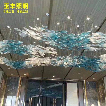 Glass decorative chandelier in hotel lobby
